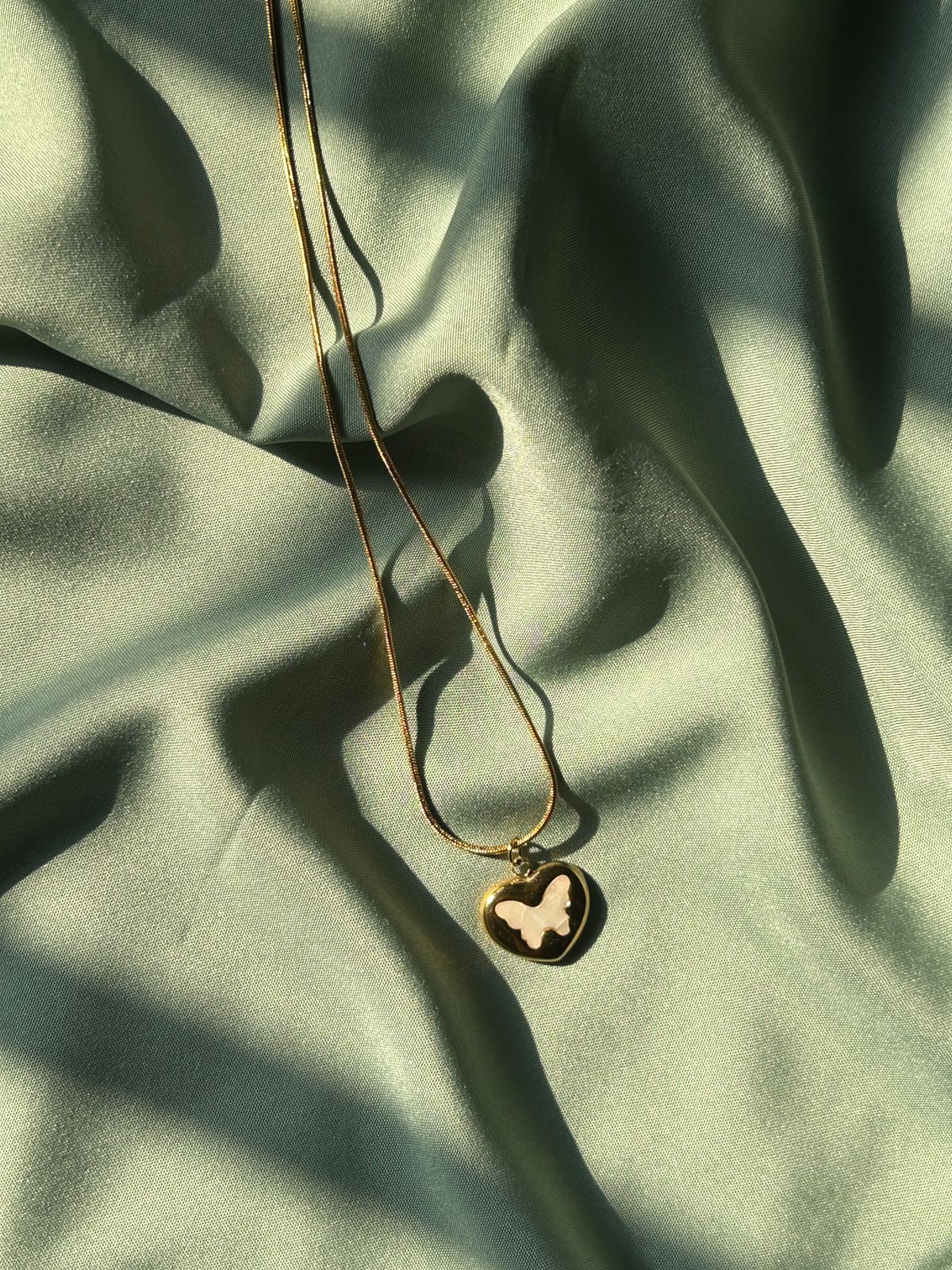 The Flutter-Heart Pendant